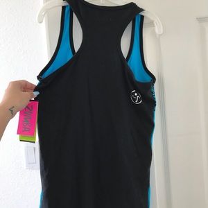 Zumba Fitness Tops - Zumba blue/black racerback tank! NWT Zumba Fitness Tops - Zumba blue/black racerback tank! NWT